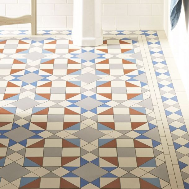 Victorian design geometric tiles in blue, white and rust 